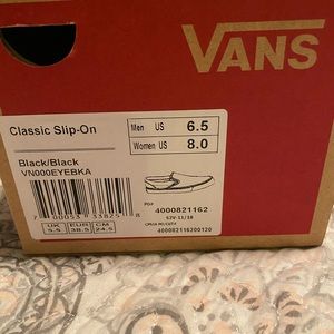 Black slip on Vans